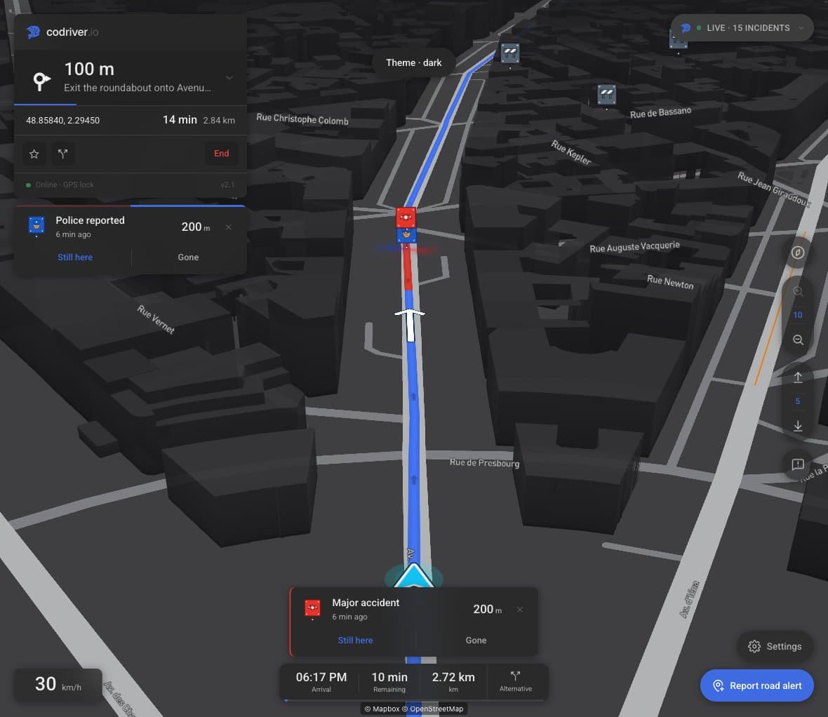 The same active route in dark mode, with the turn card and manoeuvre arrow still visible